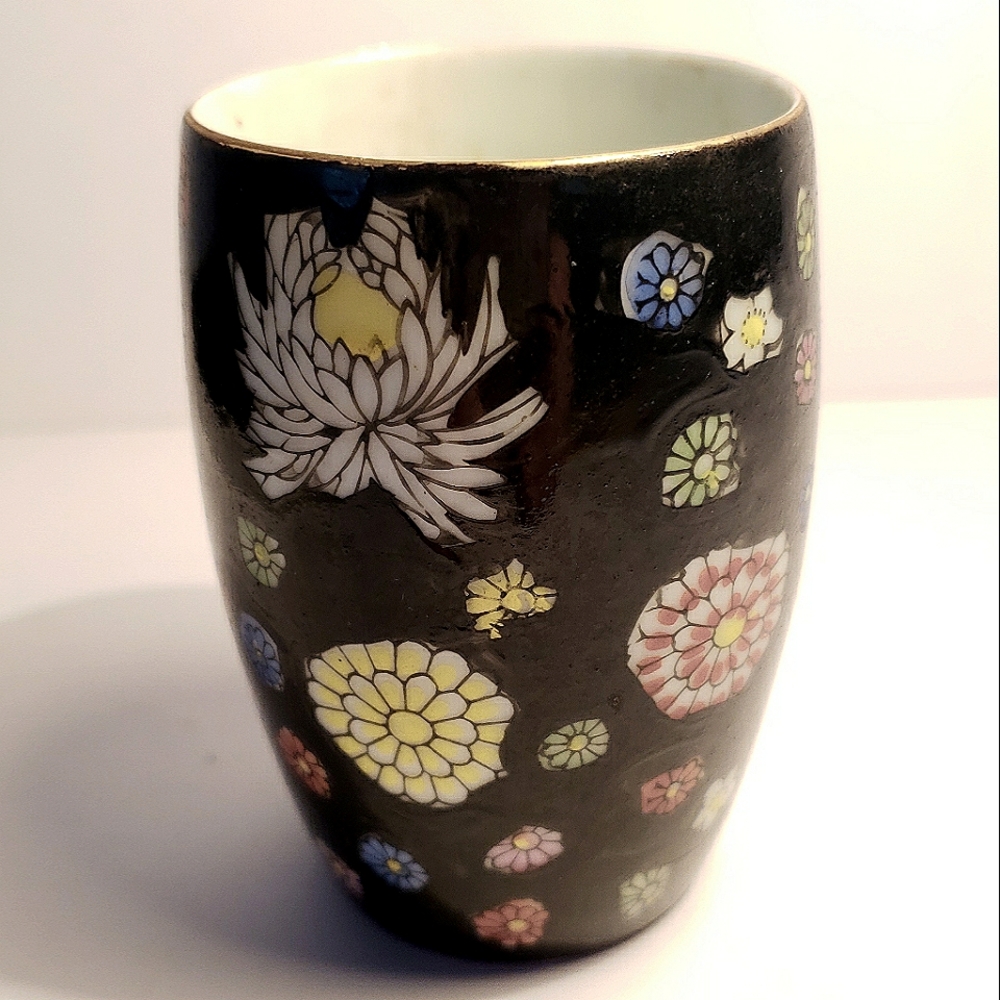 Vintage  small black vase or tumbler with multi color flowers